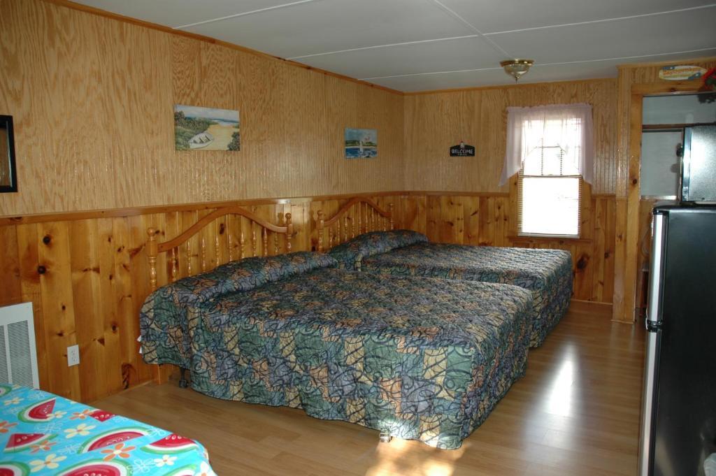 Channel Waterfront Cottages Weirs Beach Rum bild